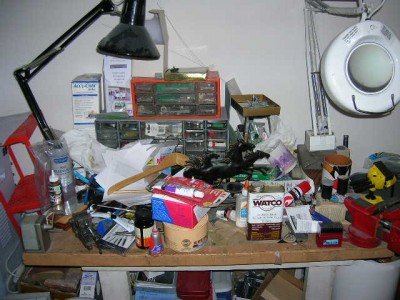 This is my workbench, when you remove the top coating.  Honey-do's seem to collect
