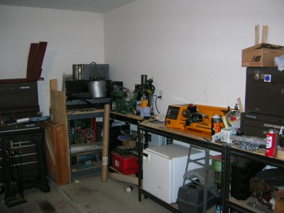 This is my tool room.  I confess, I removed the tarp and empty boxes before photo ;-)  Someday, that mill will be put back together again!!