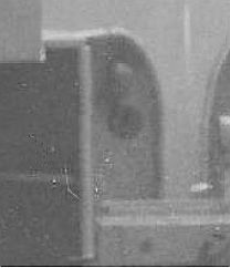 Looks like a speaker with a bell above it.