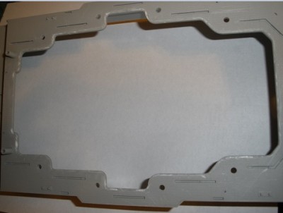 I used a plier normally used for cutting electrical wire to remove most of the plastic and then exacto knives and sanding strips for the rest.