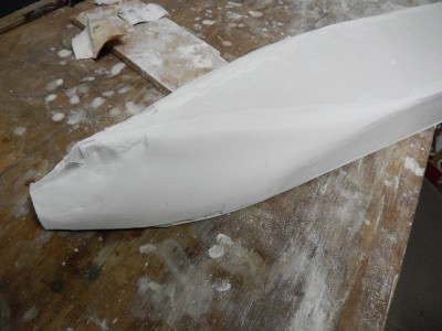 The other side, after initial sanding. This way I can identify (and limit), the places where additional filler is needed.