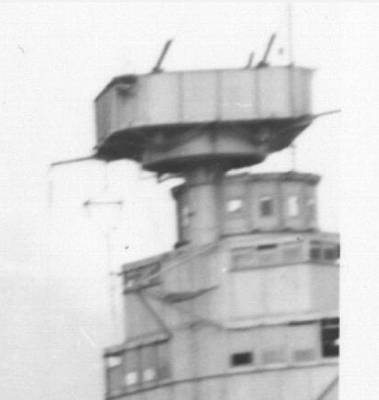 This photo clearly shows only 3 50 cal's on the Maintop of the Arizona.
