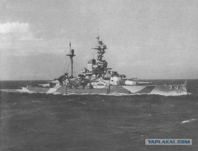 This photo shows no Soviet or British ensign, but shows the exact same camouflage in previous photo when she was officially Arkhangelsk and stationed in Kola. Note, the forward gun barrels do not have that two tone color scheme anymore. We assume this photo therefore is of Royal Sovereign, perhaps around handover, doing sea trials off Great Britain with its new Soviet crew