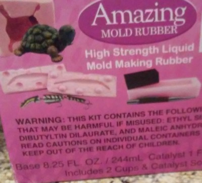 The Silicone mold material and hardener with measuring cups are in the box.