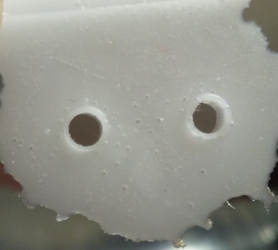 The results of using a fine layer of resin to create good port holes. The front side.