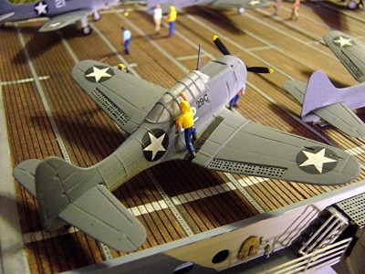 Here's one of the SBD dive bombers. All the aircraft are resin kits from JR Haynes from the UK. There are 9 -10 pieces in the kits and consist of some cast metal parts such as the props, landing gear and the cowling. It also comes with the national insignia. I added the radio antenna, pitot tube, and some bombs and bomb racks under the wings. I have also drilled out the dive flaps.