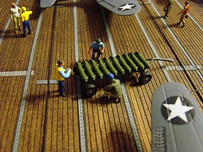 Checking bombs before loading on the SBD's. The bomb trolly is a model RR modified farm wagon. Bombs are from the parts stash box.