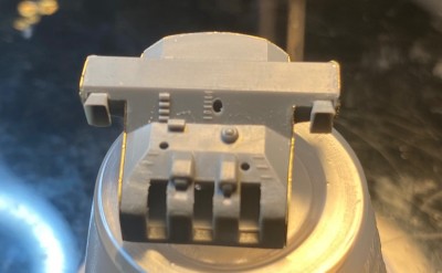 The kit part with the holes for the tripod is the wrong positions.