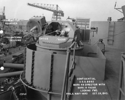 The pilot house roof (one deck above the navigating bridge deck) is bare steel in this photo of New Jersey.