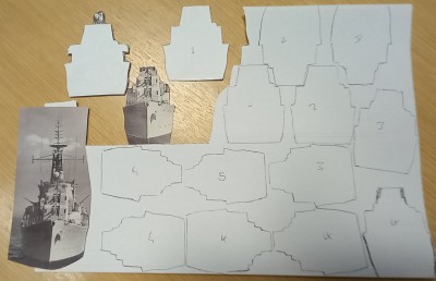 Photo, then cut out, then trace silhouette, then cut stick together.