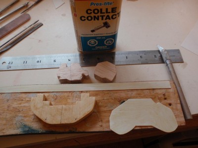 most of my decks are done this way,balsa cut out on a scrole saw and  glued with contact cement and skined with .010 styrene