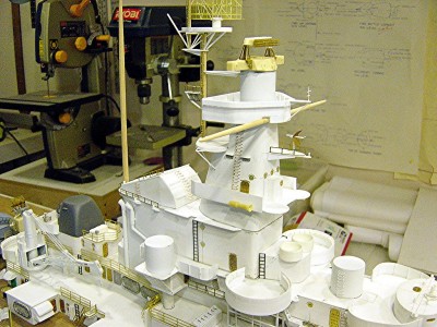 Here is a stb. view of the work completed on the fwd. citadel. Note I have added all the relevant platforms to the structure. I have also completed the forward mast assembly. A few items need to be added yet such as searchlights, more railings, ladders, sky lookouts, etc. Signal yardarm also needs to be finished. The funnel cap, the deck just in front of it and the citadel are dry fit for now, I'll permanantly mount them soon.