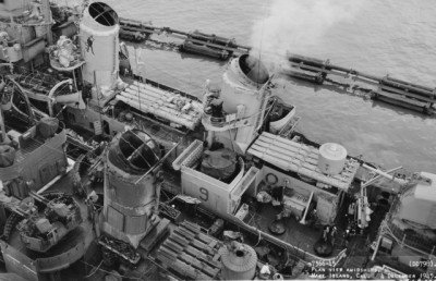 USS Monssen showing the Red Devil on the funnel and number "9" below the 40mm gun mount