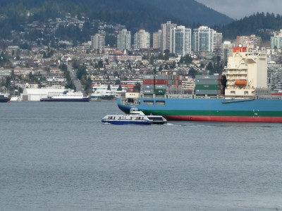 "Dear passengers, we are sorry for the delay, but there is a HUGE CONTAINER SHIP IN THE WAY!"