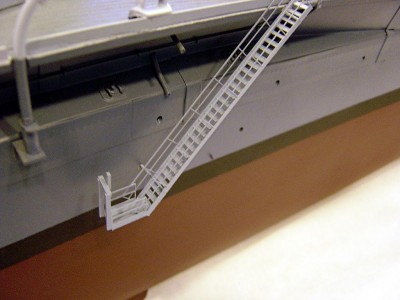 Accomodation ladders added, two stb. and one port aft. Brass P/E. The lower platform is styrene w/brass railing. Not rigged as of yet.