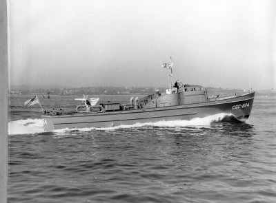 Stb. side view of the Boat underway. Note the pilothouse. This was the bronze version, early production. Bronze started to run short during the War, so later versions were fitted with a plywood pilothouse. More angular and less of a chamber on the roof. Basic layout was the same in either case.