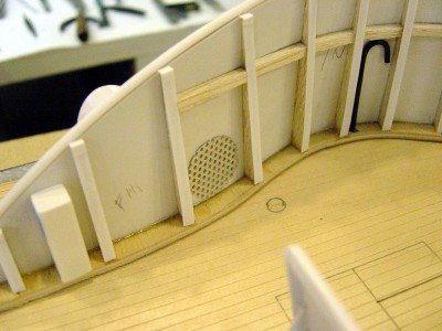 Here more details added. Scuttle grating made from perforated aluminum. Gooseneck vent for officers toilet made from wire. There are three scuttles on the deck, 2 aft and 1 fwd. During hot weather, the scuttle plate was removed and the grating put in its place to help circulate fresh air through the boat.