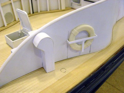 More details added here. Life preserver is cast resin. The holder is styrene strip. Vent you see is engine room blower exhaust, made from balsa block and again wrapped with thin styrene. They had to run the exhaust blowers for engine room for at least 10 minutes, except in emergency situations. Note the forward engine room hatch, open.