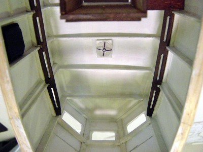 More details added to the inside of the pilothouse. I have added grabrails made from 1/16" balsa, and the cabin light which was vac-formed from the head of a upholstry tack. Black box to the left is a heater.