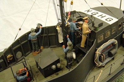 Here we have the bridge area. I had a real difficult time in finding figures. Some of these are Tamiya race car pit crew figures, some are RN figures. All had to be modified to suit the scene. I made all the helmets on the crew from a small master pattern that I then used to vac form the part.