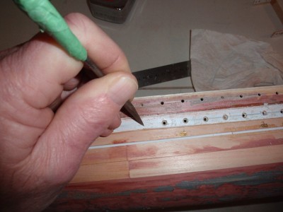 poking a small hole with a scribe