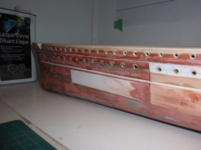 eyebrows on hull,tacked on with white glue ,then i paint on a coat of future acryilic.to realy stick them on