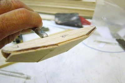 Here I have added 1/16" balsa sheet between the back and the top sides to get the basic shape. I'll true this up a bit with 80 grit sandpaper before proceeding.