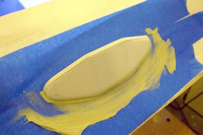 Due to the shape of the hull, the fwd. sponson does not fit quite right. I have masked it off here and have applied filler to get rid of any small gaps between the sponson and the hull side joint.