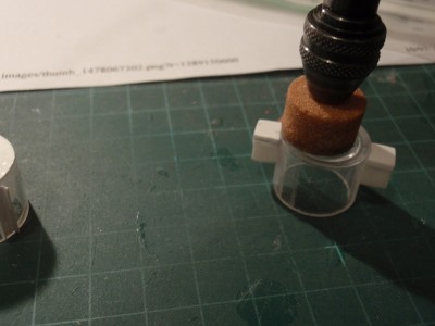 grinding wheel used to make the fit on the styrene piece to the plactic part