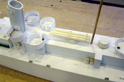 Portside midships here showing the 20MM locations and the triple torpedo tubes. Tubes are cast resin and will be detailed out further. Support struts will be added to the aft mast here also.