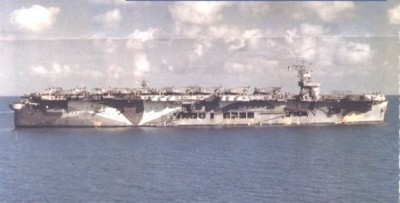 The USS Santee was the only escort carrier of the Sangamon Class to use Measure 17 camoflage, a scheme that was the same on both port as starboard. Santee was converted from the tanker Esso Seakey in 1942.