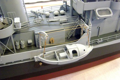 Good view of the 26' MWB here. Davits are cast metal. Note the practice loading machine just in front of the stack. Other details include a watch desk, cane fenders and draped firehose. Inclined ladder is p/e brass. I did some simple rigging here. I made the liferafts from cast resin.