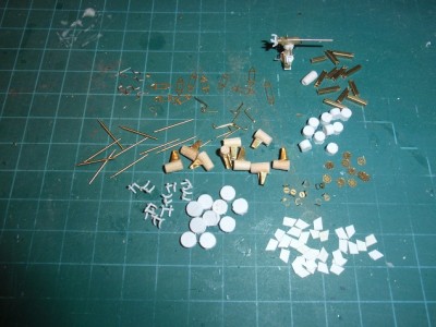 all the parts and pieces to build 12 guns