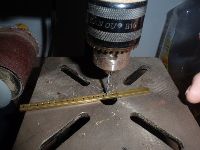 i used my drill press to make the holes in the box beam