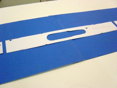 Heres the center section. The patterns were transferred to .020 scribed styrene, and then cut out. This center section is wood on the Gato class, also. Note the cutout for the kit conning tower/ sail assy. This area will be removed from the kit deck to facilitate the installation of the new conning tower / sail assy.