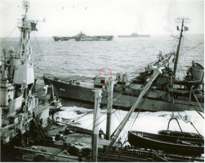 0555607 dd556 refueling USS hornet in background red.jpg