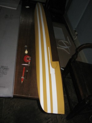 The raised hull plates and rubbing strakes are added to the plug halves.