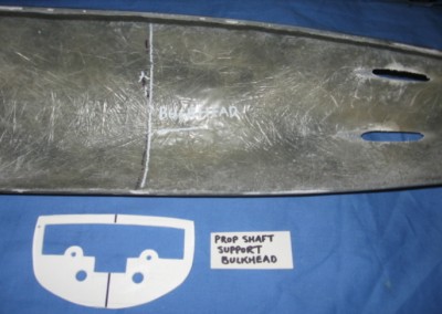 The stern tube support bulkhead cut from 2.5 mm plastic card. It's fitting position has been marked on the hull.