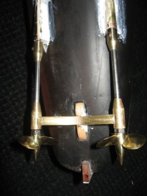 The stern tubes in place. Milliput is used to fair them into the hull.