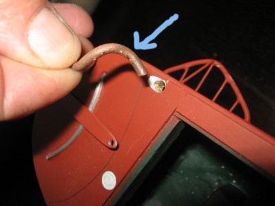 Copper S shaped tubes inserted at the most aft (dummy) pulley of the steering linkages.
