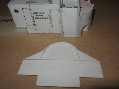 The underside of the upper bridge floor and bridge wings. The small triangular "gussets" reinforce the support legs.