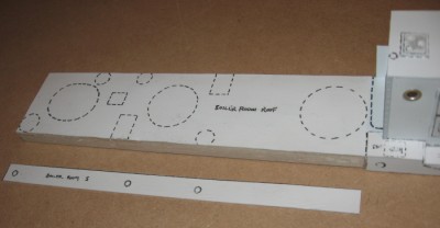 Cladding the boiler room roof "core" with the printed 1.5mm plastic card elements.