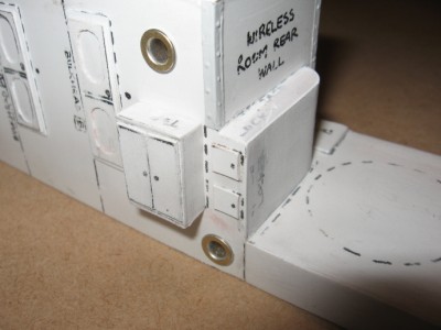 The locker arrangements on the rear wall of the WT room, just forward of the funnel position.