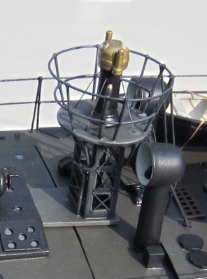 The finished item straddles the joint in the deck. The WRONG shaped vent cowls can be seen before they are replaced! The compass binnacle is also a cast resin fitting.
