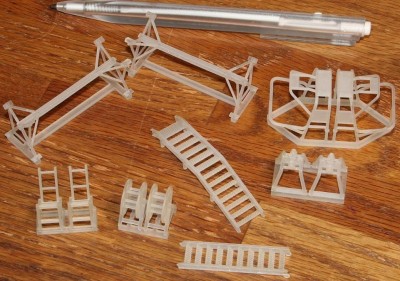 A bunch of spindly parts, including saftey cages for the RIBs and the RIB's cradles.