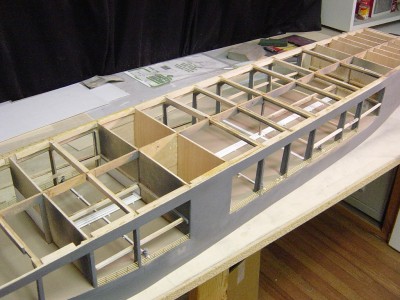 Heres an overall view from portside. Note the piping I have added as well as other details. This was rather difficult as I had to work inside the framework of the model. Not much room for hands!! Note I have beefed up the framework since my last post.