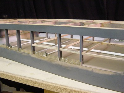 The hanger deck support can be seen clearly here. Once the main deck is painted I'll install the hanger deck floor and then add some aircraft which will be visible thru those hull openings. I may lite up these areas with some small 12V bulbs......any thoughts??