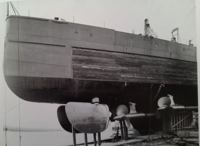 This photo from the book shows the props and rudders, it was taken the day before launching. The wood area is the recess for the armour