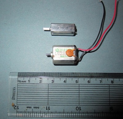 The tiny motor is more than powerful enough to propel the model at a scale speed. The standard servo motor is alongside