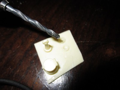 Many of the holes, that needed drilling into the resin components, were made before the fitting was cut from the base.